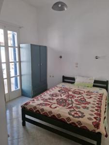 Postel nebo postele na pokoji v ubytování Room Stelios On The Beach