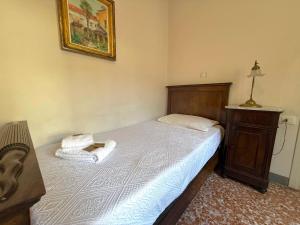 Albergo Dellangelo客房内的一张或多张床位
