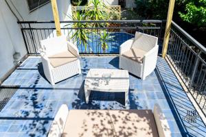 Μπαλκόνι ή βεράντα στο Lush Escape Suites - hottube and sauna