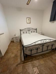 Ένα ή περισσότερα κρεβάτια σε δωμάτιο στο Casa vacanza Salento