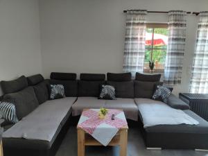 Posezení v ubytování Exklusive Ferienwohnung am Traunfall