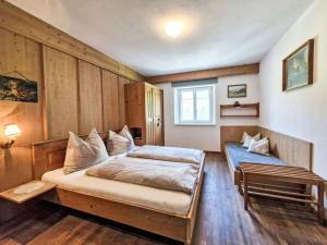 Postel nebo postele na pokoji v ubytování Apartment Leo by Interhome