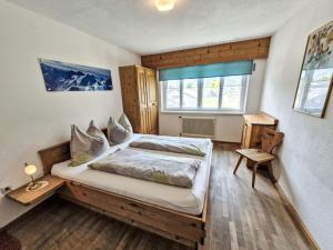 Postel nebo postele na pokoji v ubytování Apartment Leo by Interhome