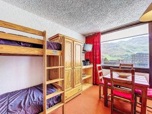 Postel nebo postele na pokoji v ubytování Apartment Aravis 101 by Interhome