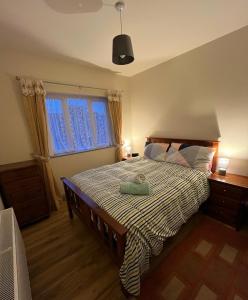 Postel nebo postele na pokoji v ubytování Teach Molcamor, Achill Island