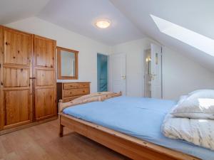 Łóżko lub łóżka w pokoju w obiekcie Holiday Home Mały dworek by Interhome