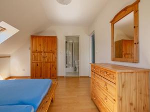 Łóżko lub łóżka w pokoju w obiekcie Holiday Home Mały dworek by Interhome