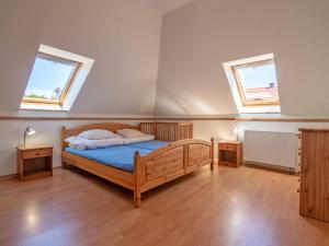 Łóżko lub łóżka w pokoju w obiekcie Holiday Home Mały dworek by Interhome