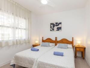 Posteľ alebo postele v izbe v ubytovaní Apartment Riviera Park J 37 by Interhome