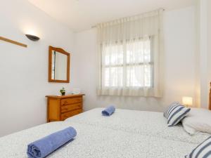 Postel nebo postele na pokoji v ubytování Apartment Riviera Park J 37 by Interhome