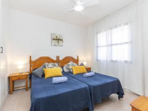 Posteľ alebo postele v izbe v ubytovaní Apartment Riviera Park J 52 by Interhome