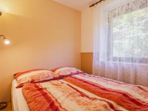 Postel nebo postele na pokoji v ubytování Holiday Home Romantica by Interhome