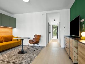 Televisyen dan/atau pusat hiburan di Apartment Marina Lelle by Interhome