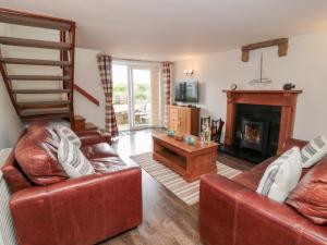 Et opholdsområde på Fairhaven Cottage