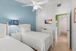 Postel nebo postele na pokoji v ubytování Indigo Reef #57 - Turtle Cove - Luxury Waterfront Villa, 31' Dock + 33 fotografií