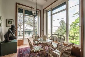 Posezení v ubytování Villa I Tigli - by MyHomeInComo