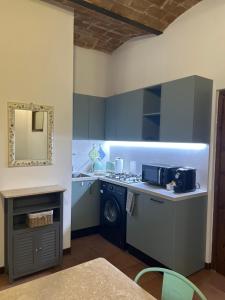 Køkken eller tekøkken på Casetta al Corso