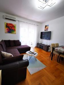 TV a/nebo společenská místnost v ubytování Apartments Mara Cres