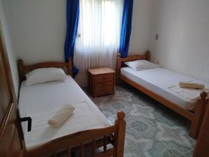 Postel nebo postele na pokoji v ubytování Apartmani Maravella