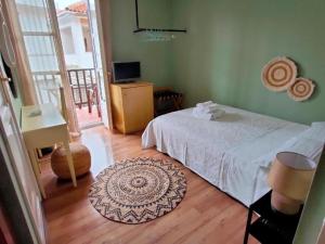 Postel nebo postele na pokoji v ubytování Galini Hotel Agios Ioannis Pelion