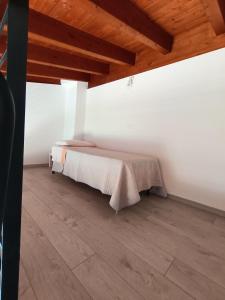 Postel nebo postele na pokoji v ubytování Agriturismo Cascina Lert