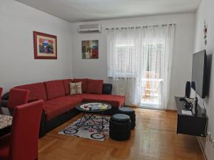 TV a/nebo společenská místnost v ubytování Apartments Mara Cres