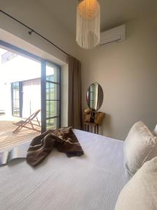 Ένα ή περισσότερα κρεβάτια σε δωμάτιο στο Casa Amanhada Apartamento Zero