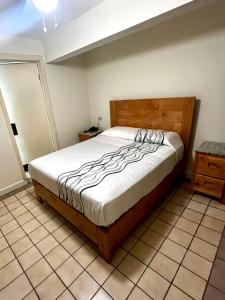 Postel nebo postele na pokoji v ubytování Hotel León