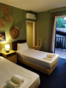 Postel nebo postele na pokoji v ubytování Galini Hotel Agios Ioannis Pelion