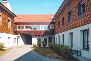 an external view of a building with a courtyard at Maribella Apartment in Maribor