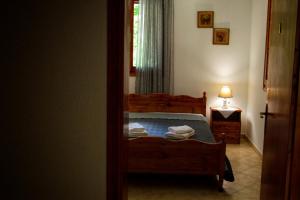 Postel nebo postele na pokoji v ubytování Λευκή Καμέλια
