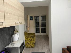 Kuchyň nebo kuchyňský kout v ubytování Happy Hostel