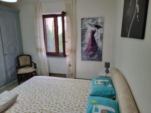 Postel nebo postele na pokoji v ubytování Rosy Vacation Home