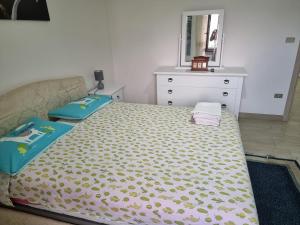 Postel nebo postele na pokoji v ubytování Rosy Vacation Home
