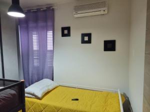 Postel nebo postele na pokoji v ubytování Rosy Vacation Home