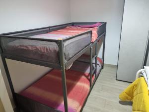 Postel nebo postele na pokoji v ubytování Rosy Vacation Home