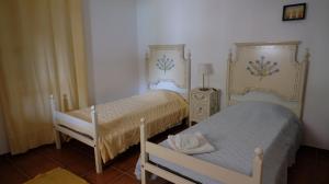 Ένα ή περισσότερα κρεβάτια σε δωμάτιο στο Monte Sol +54 φωτογραφίες