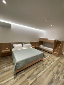 Postel nebo postele na pokoji v ubytování Nettuno Resort Orikum
