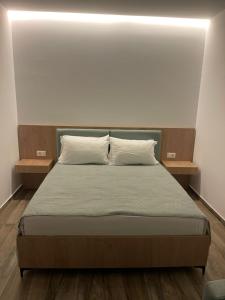Postel nebo postele na pokoji v ubytování Nettuno Resort Orikum