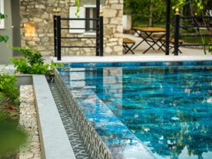 Πισίνα στο ή κοντά στο Filippos Home