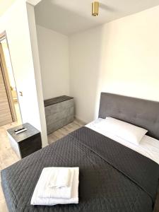 Llit o llits en una habitació de AL CUOR NON Si COMANDA