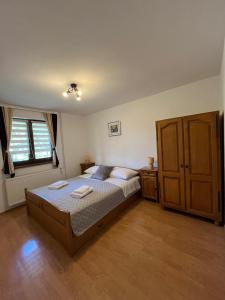 Postel nebo postele na pokoji v ubytování Studio Apartmani Patricia + 37 fotografií