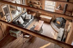 an overhead view of a living room with a stove at Cozy w Fire Pit Grill Deck Screened Porch WiFi in Harpers Ferry