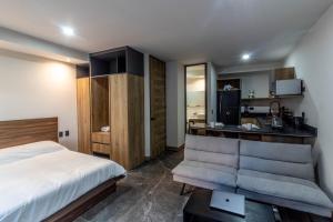 Η κουζίνα ή μικρή κουζίνα στο LOFT en Americana Torre con alberca, Gym, Pet fr