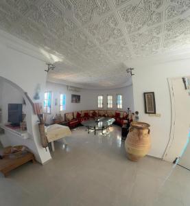 Posezení v ubytování maison d hôte rêve de désert jerba