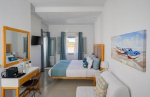A bed or beds in a room at Impressive One