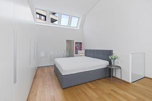 Postel nebo postele na pokoji v ubytování Bodensee Loft in Strandnähe