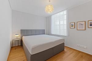 Postel nebo postele na pokoji v ubytování Bodensee Loft in Strandnähe