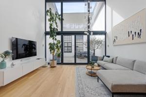 TV a/nebo společenská místnost v ubytování Bodensee Loft in Strandnähe