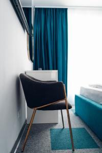 Postel nebo postele na pokoji v ubytování Ora Hotel